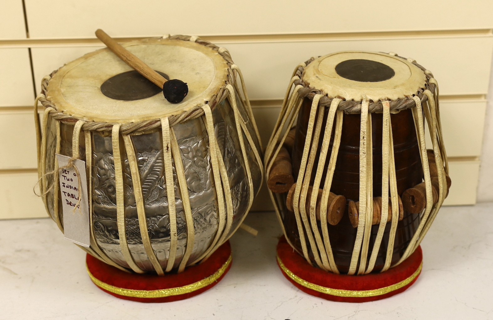 Two Indian Tabla Drums, largest 25 cms diameter.